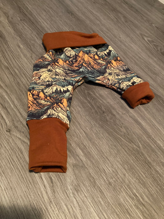 Rustic mountains grow with me pants
