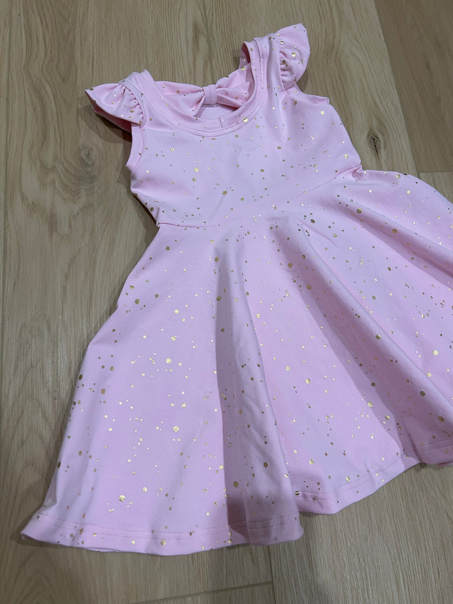Pink, bow-backed, flutter dress