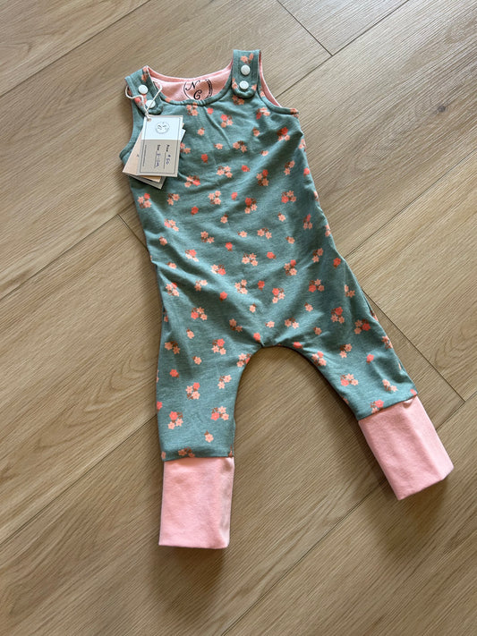 green floral grow with me romper